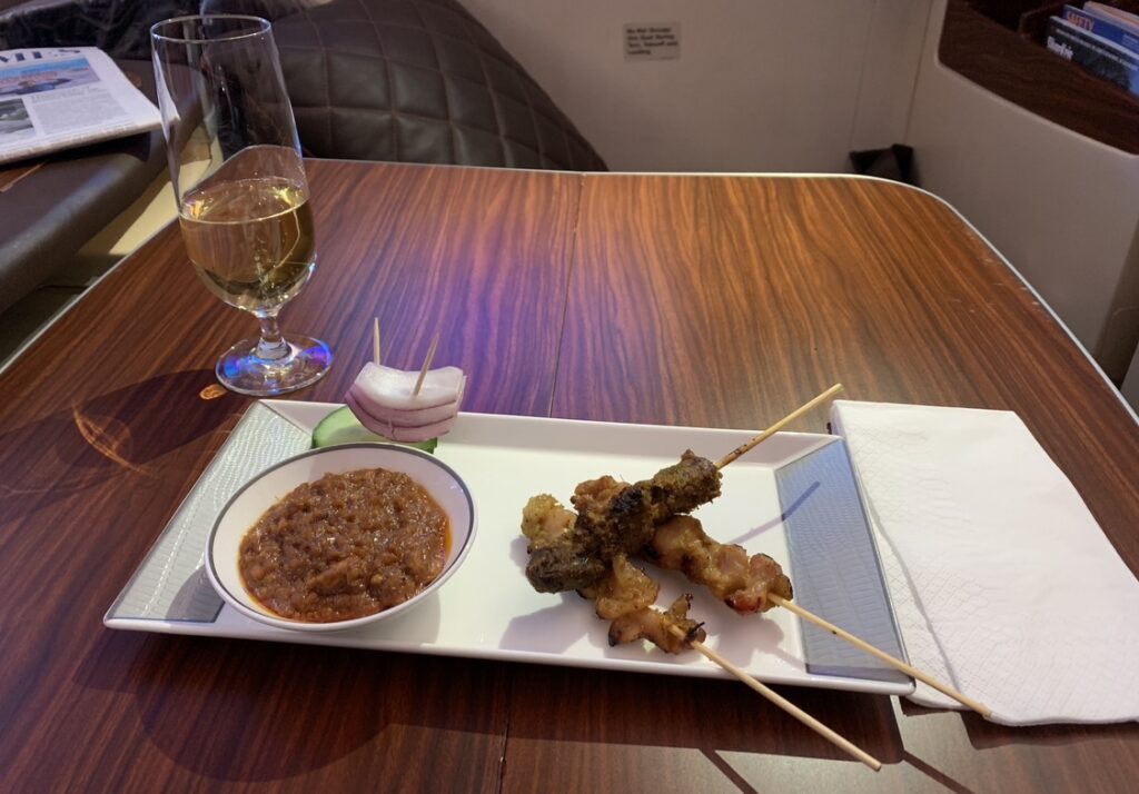 Signature satay! also available at business class